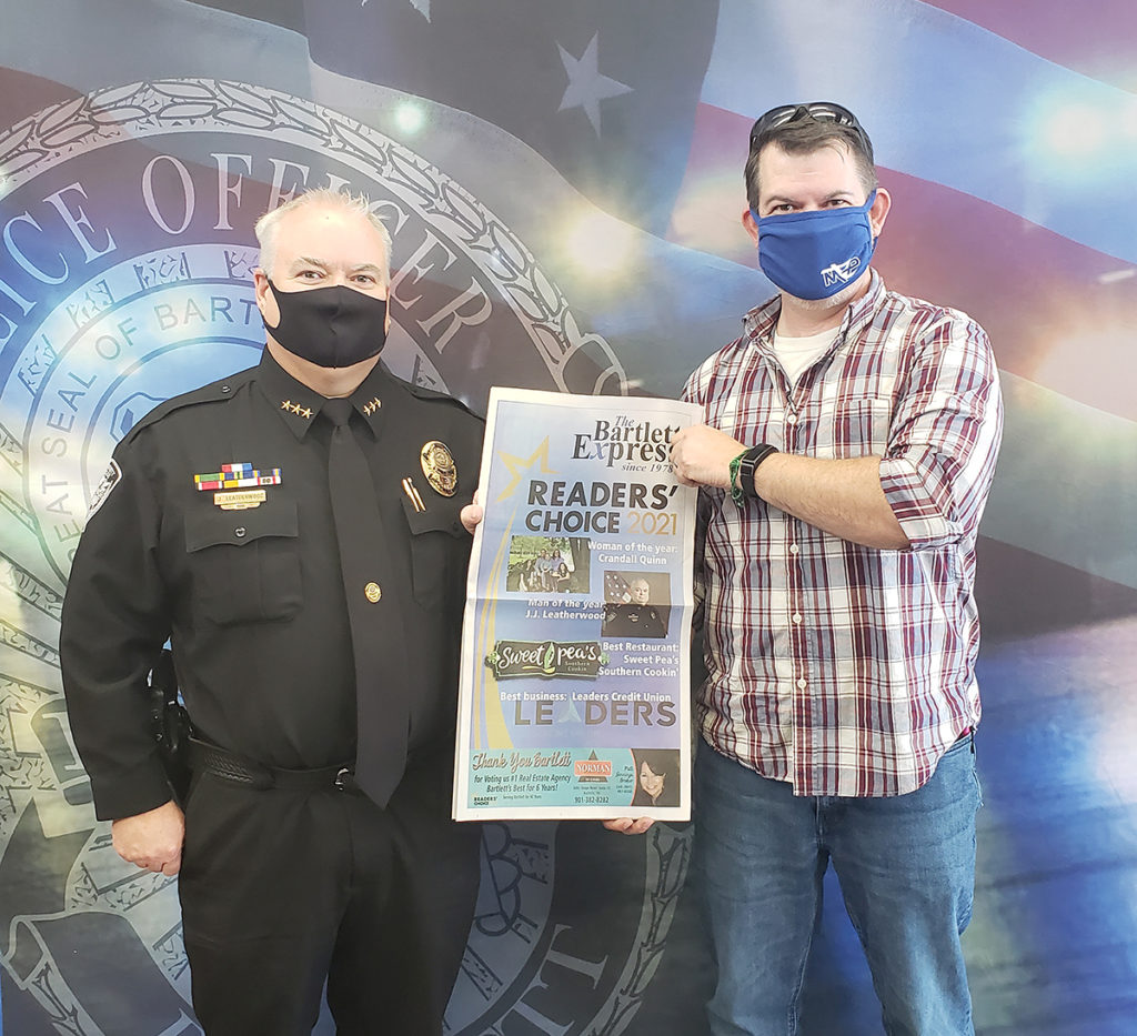 Bartlett Express Editor Mark Richardson with The Bartlett Express  Readers' Choice Man of the Year, J.J. Leatherwood.  Chief Inspector Leatherwood said he was, "Grateful to everyone for this honor.  We've been trying to be out there more and do good things in the community."
